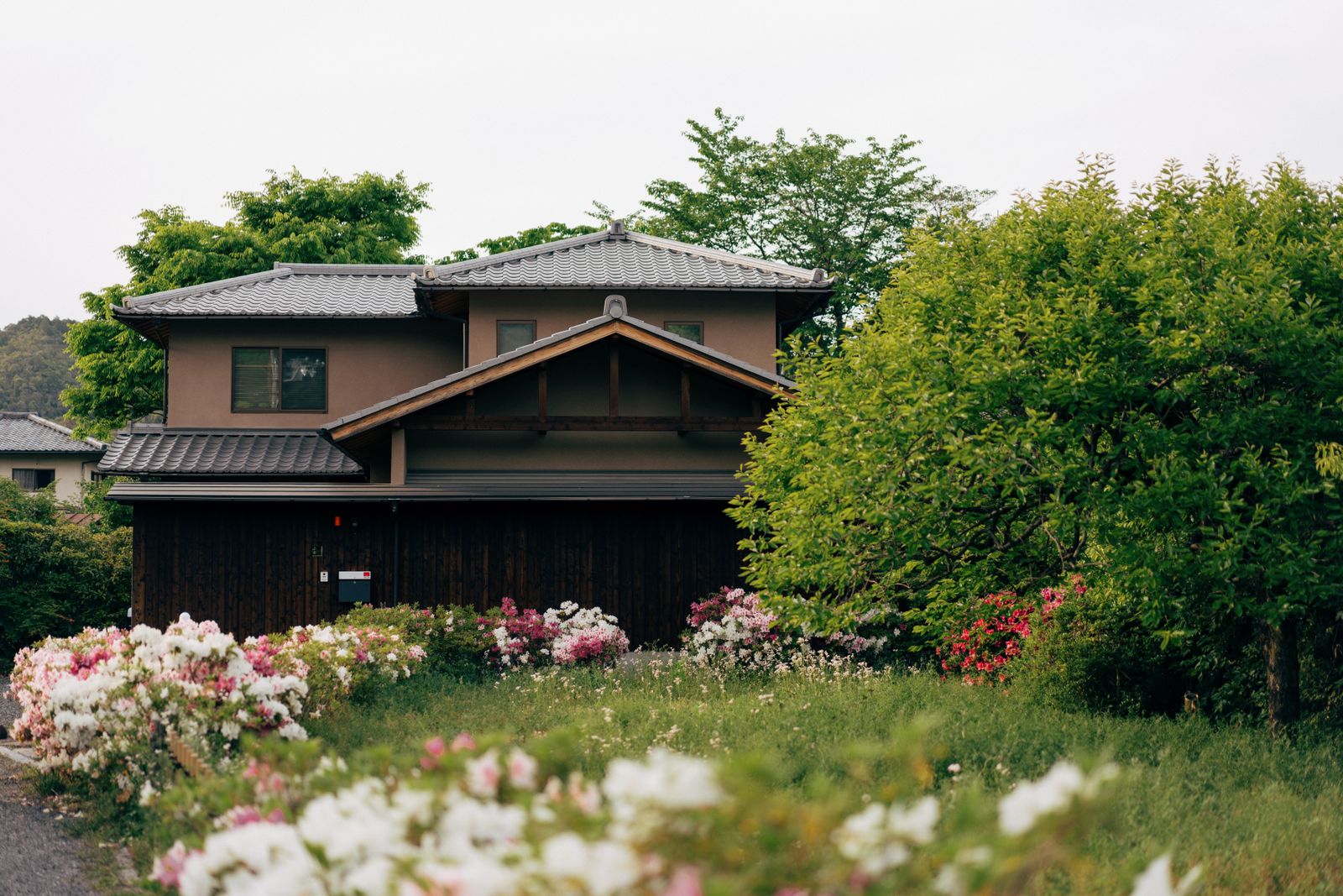 Traditional Japanese house surrounded by a garden